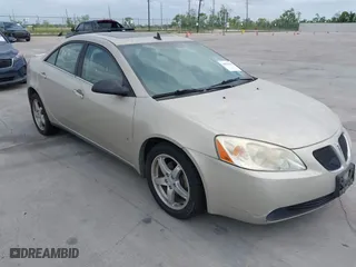 2009 Pontiac G6 w/1SA *Ltd Avail* with VIN 1G2ZG57N394223449, listed as a IAAI auction lot 42070388 with 75,089 mi miles. Bid and sale history available at carsss.com. Image 1.