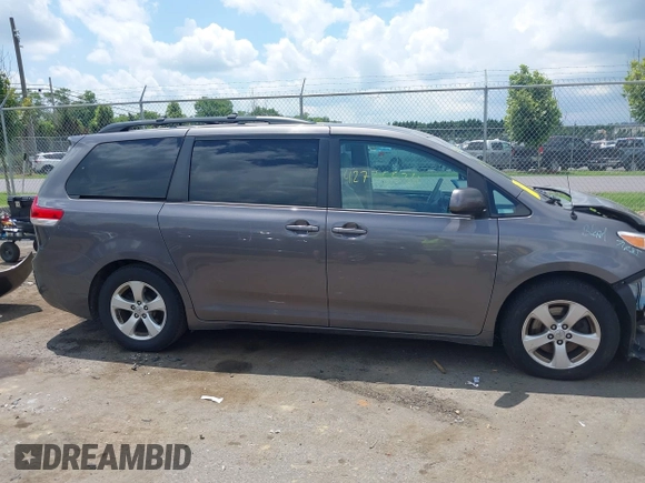 2014 Toyota Sienna LE AAS with VIN 5TDKK3DC3ES435091, listed as a IAAI auction lot 42735534 with 150,132 mi miles and . Bid and sale history available at DreamBid. Image 13.