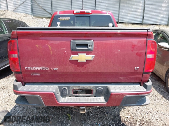 2018 Chevrolet Colorado 4WD LT z VIN 1GCGTCENXJ1214811, wystawiony jako IAAI lot #42418878 z przebiegiem 80 453 mil mil oraz . Historia ofert i sprzedaży dostępna na DreamBid. Obrazek 16.