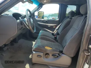 2002 Ford F-150 XL z VIN 1FTRX18L52NB59531, wystawiony jako Copart lot #58550365 z przebiegiem 267 424 mil mil oraz Szkoda całkowita • Salvage title. Historia ofert i sprzedaży dostępna na DreamBid. Obrazek 7.