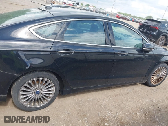 2016 Ford Fusion Titanium with VIN 3FA6P0K97GR135106, listed as a IAAI auction lot 42269165 with 155,036 mi miles and . Bid and sale history available at DreamBid. Image 13.