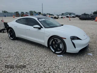 2021 Porsche Taycan z VIN WP0AA2Y1XMSA19047, wystawiony jako Copart lot #53094735 z przebiegiem 58 025 mil mil oraz Szkody całkowita. Historia ofert i sprzedaży dostępna na DreamBid. Obrazek 4.