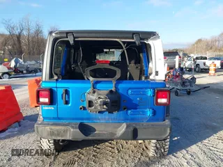 2021 Jeep Wrangler Unlimited Sport S with VIN 1C4HJXDN4MW779291, listed as a IAAI auction lot 41290109 with 43,379 mi miles and . Bid and sale history available at DreamBid. Image 16.