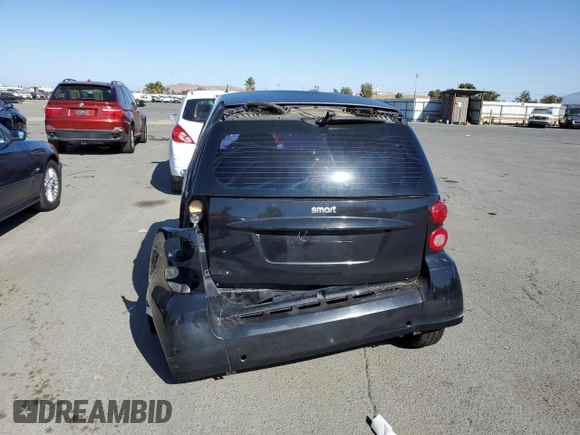 2009 Smart fortwo Pure z VIN WMEEJ31X49K253051, wystawiony jako Copart lot #70193934 z przebiegiem Nie podano mil oraz Szkody całkowita. Historia ofert i sprzedaży dostępna na DreamBid. Obrazek 6.