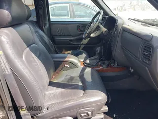 1998 Oldsmobile Bravada z VIN 1GHDT13W4W2715305, wystawiony jako IAAI lot #42061884 z przebiegiem 146 269 mil mil oraz . Historia ofert i sprzedaży dostępna na DreamBid. Obrazek 5.
