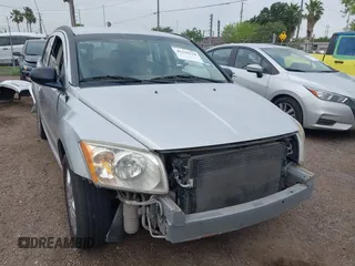 2009 Dodge Caliber SXT with VIN 1B3HB48A59D143888, listed as a IAAI auction lot 42110334 with 182,674 mi miles and . Bid and sale history available at DreamBid. Image 1.