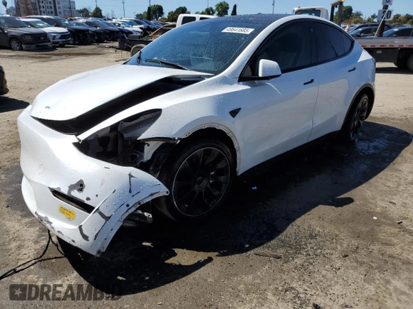 2022 Tesla Model Y Long Range z VIN 7SAYGDEEXNF455766, wystawiony jako Copart lot #49641685 z przebiegiem 51 142 mil mil oraz Szkoda całkowita • Salvage title. Historia ofert i sprzedaży dostępna na DreamBid. Obrazek 1.