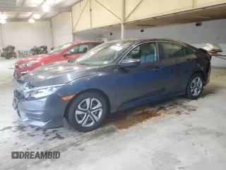 2017 Honda Civic LX z VIN 2HGFC2F5XHH564425, wystawiony jako Copart lot #56656475 z przebiegiem 102 928 mil mil oraz Szkoda całkowita • Salvage title. Historia ofert i sprzedaży dostępna na DreamBid. Obrazek 1.
