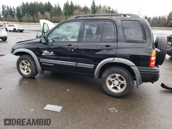 2003 Chevrolet Tracker ZR2 z VIN 2CNBJ734736946410, wystawiony jako Copart lot #82210474 z przebiegiem 61 414 mil mil oraz Szkoda całkowita • Salvage title. Historia ofert i sprzedaży dostępna na DreamBid. Obrazek 2.
