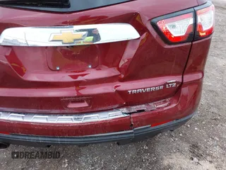 2016 Chevrolet Traverse LTZ z VIN 1GNKVJKD8GJ167038, wystawiony jako IAAI lot #41878254 z przebiegiem 159 771 mil mil oraz . Historia ofert i sprzedaży dostępna na DreamBid. Obrazek 6.