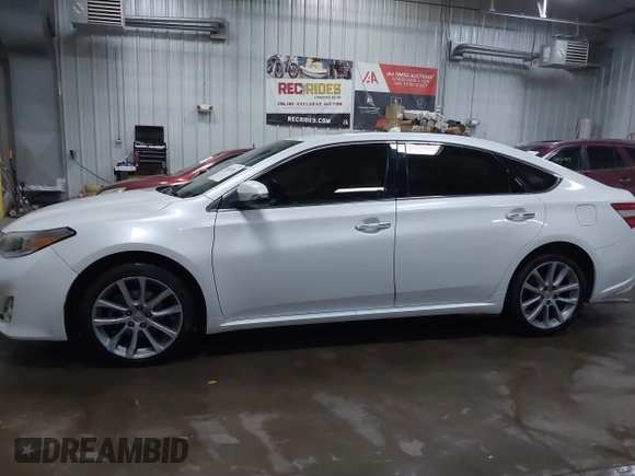 2014 Toyota Avalon Limited with VIN 4T1BK1EB6EU100635, listed as a IAAI auction lot 41609581 with 128,609 mi miles. Bid and sale history available at carsss.com. Image 14.