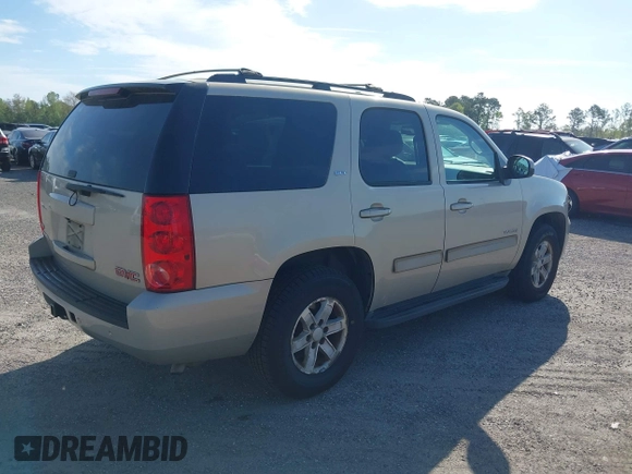 2010 GMC Yukon SLT with VIN 1GKMCCE3XAR225380, listed as a IAAI auction lot 41904723 with 173,686 mi miles. Bid and sale history available at carsss.com. Image 4.