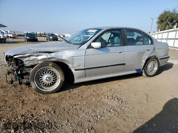 2000 BMW 5 Series 528iA with VIN WBADM6345YGU29738, listed as a Copart auction lot 75176334 with 160,821 mi miles and Salvage Title. Bid and sale history available at carsss.com. Image 1.