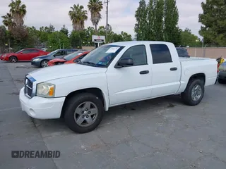 2006 Dodge Dakota SLT with VIN 1D7HE48N26S698223, listed as a IAAI auction lot 42586220 with 100,548 mi miles and . Bid and sale history available at DreamBid. Image 2.