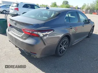 2023 Toyota Camry SE with VIN 4T1G11AK5PU163629, listed as a IAAI auction lot 42262131 with 47,617 mi miles and . Bid and sale history available at DreamBid. Image 4.