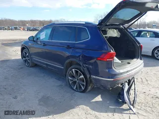 2022 Volkswagen Tiguan SEL R-Line with VIN 3VV4B7AX6NM050942, listed as a IAAI auction lot 41067353 with 38,634 mi miles. Bid and sale history available at carsss.com. Image 3.