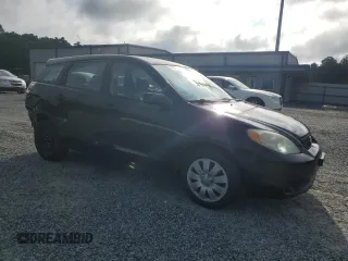 2006 Toyota Matrix STD with VIN 2T1KR32E06C574475, listed as a Copart auction lot 61020935 with 142,942 mi miles and Salvage title. Bid and sale history available at DreamBid. Image 4.