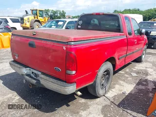 1998 Ford F-150 with VIN 1FTZX17W4WNC42305, listed as a IAAI auction lot 42634349 with 325,675 mi miles and . Bid and sale history available at DreamBid. Image 4.