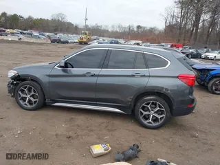 2017 BMW X1 xDrive28i with VIN WBXHT3C37H5F86637, listed as a IAAI auction lot 41300161 with 95,459 mi miles. Bid and sale history available at carsss.com. Image 14.
