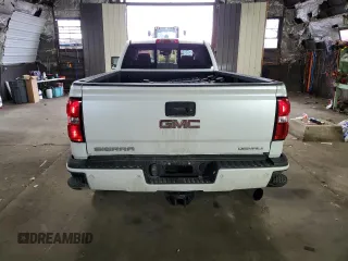 2019 GMC Sierra 3500HD Denali z VIN 1GT42WEY6KF250694, wystawiony jako Copart lot #50035115 z przebiegiem 59 735 mil mil oraz Szkody całkowita. Historia ofert i sprzedaży dostępna na DreamBid. Obrazek 6.