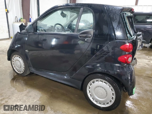 2015 Smart fortwo Passion с VIN WMEEJ3BA6FK820446, выставлен на аукционе Copart как лот 63243635 с пробегом Не указан миль и Списание • Salvage title. История ставок и продаж доступна на DreamBid. Изображение 2.
