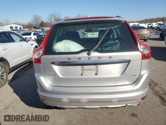 2015 Volvo XC60 z VIN YV4940RA8F2609421, wystawiony jako Copart lot #86134784 z przebiegiem 20 214 mil mil oraz Szkoda całkowita • Salvage title. Historia ofert i sprzedaży dostępna na DreamBid. Obrazek 6.