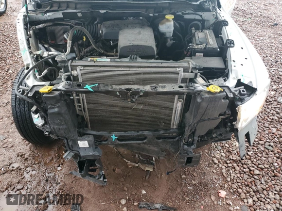 2021 Ram 1500 Tradesman with VIN 3C6JR6DG0MG535990, listed as a Copart auction lot 58473625 with 39,260 mi miles and Salvage title. Bid and sale history available at DreamBid. Image 11.