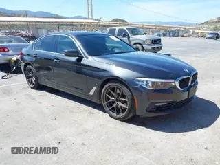 2018 BMW 5 Series 530e xDrive with VIN WBAJB1C58JB085443, listed as a IAAI auction lot 41856298 with 93,110 mi miles and . Bid and sale history available at carsss.com. Image 1.