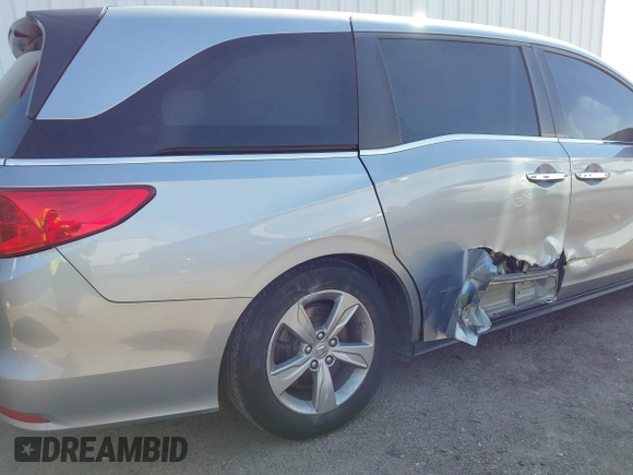 2019 Honda Odyssey EX-L with VIN 5FNRL6H79KB043145, listed as a IAAI auction lot 41569198 with 94,560 mi miles. Bid and sale history available at carsss.com. Image 6.