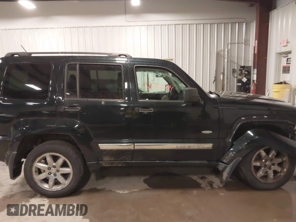 2012 Jeep Liberty Sport with VIN 1C4PJMAKXCW169544, listed as a IAAI auction lot 42045754 with 77,829 mi miles. Bid and sale history available at carsss.com. Image 13.