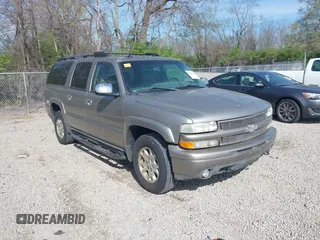 2003 Chevrolet Suburban Z71 with VIN 3GNFK16Z73G190936, listed as a IAAI auction lot 42078452 with 231,121 mi miles. Bid and sale history available at carsss.com. Image 1.
