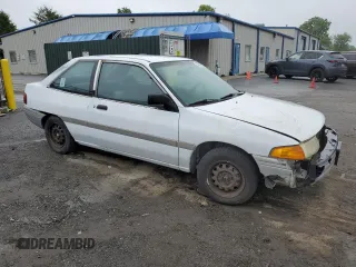 1992 Ford Escort z VIN 1FAPP11J5NW167729, wystawiony jako Copart lot #57692925 z przebiegiem 73 341 mil mil oraz Tytuł czysty. Historia ofert i sprzedaży dostępna na DreamBid. Obrazek 4.