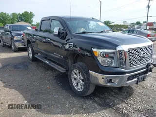 2016 Nissan Titan Platinum Reserve with VIN 1N6BA1F42GN512696, listed as a IAAI auction lot 42562522 with 138,384 mi miles and . Bid and sale history available at DreamBid. Image 1.