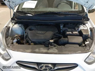 2013 Hyundai Accent GL with VIN KMHCT5AE1DU088241, listed as a IAAI auction lot 41909194 with 87,622 mi miles. Bid and sale history available at carsss.com. Image 10.