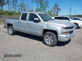 2018 Chevrolet Silverado 1500 LT with VIN 1GCVKREC9JZ335603, listed as a IAAI auction lot 41853399 with 152,460 mi miles and . Bid and sale history available at DreamBid. Image 1.