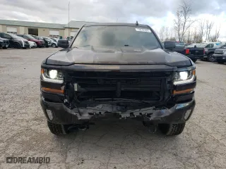 2018 Chevrolet Silverado 1500 LT with VIN 1GCVKREH7JZ217819, listed as a Copart auction lot 77070104 with 130,709 mi miles and Salvage Title. Bid and sale history available at carsss.com. Image 5.