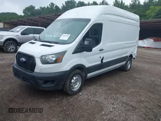 2023 Ford Transit Cargo with VIN 1FTBR1X8XPKA13479, listed as a IAAI auction lot 42608306 with 61,767 mi miles and . Bid and sale history available at DreamBid. Image 2.