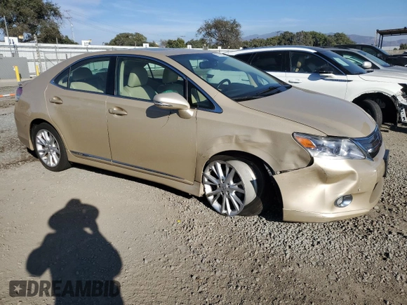 2010 Lexus HS 250h with VIN JTHBB1BA3A2018091, listed as a Copart auction lot 83114234 with 219,314 mi miles and Salvage Title. Bid and sale history available at DreamBid. Image 4.