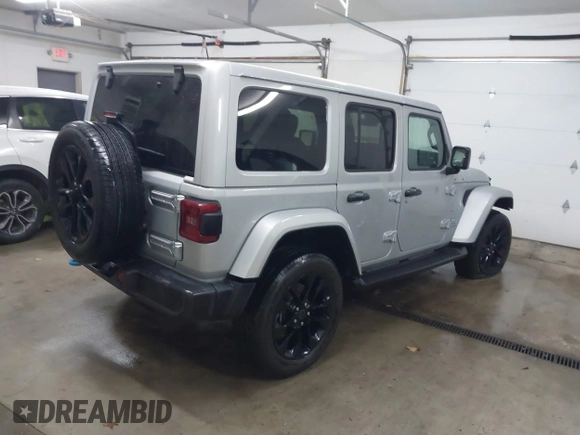 2024 Jeep Wrangler Sahara with VIN 1C4RJXP63RW202929, listed as a IAAI auction lot 41002346 with 12,332 mi miles and . Bid and sale history available at DreamBid. Image 4.