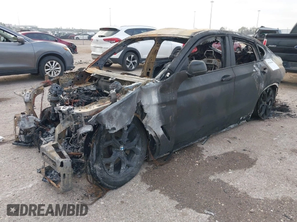 2020 BMW X4 xDrive30i with VIN 5UX2V1C00L9B30132, listed as a IAAI auction lot 41769464 with Not provided miles and . Bid and sale history available at DreamBid. Image 2.