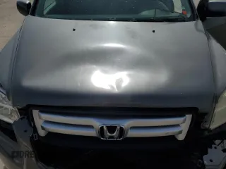 2007 Honda Pilot EX with VIN 2HKYF18427H514637, listed as a Copart auction lot 52306725 with 142,578 mi miles and Salvage Title. Bid and sale history available at carsss.com. Image 13.
