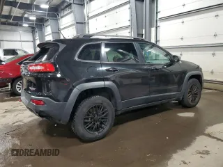 2014 Jeep Cherokee Trailhawk with VIN 1C4PJMBS5EW294212, listed as a Copart auction lot 88816885 with 151,779 mi miles and Salvage title. Bid and sale history available at DreamBid. Image 3.