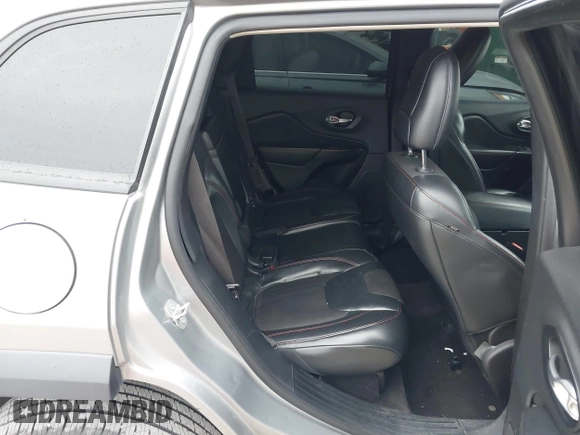 2016 Jeep Cherokee Trailhawk with VIN 1C4PJMBS7GW192574, listed as a IAAI auction lot 41986638 with 144,970 mi miles and . Bid and sale history available at DreamBid. Image 8.