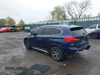 2019 BMW X1 sDrive28i with VIN WBXHU7C5XK5L10933, listed as a IAAI auction lot 41931162 with 55,308 mi miles. Bid and sale history available at carsss.com. Image 3.