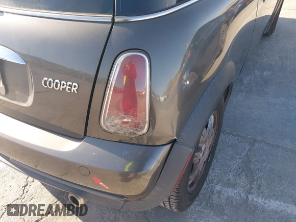2006 MINI Hardtop with VIN WMWRC33586TJ75043, listed as a IAAI auction lot 41948235 with 138,402 mi miles and . Bid and sale history available at DreamBid. Image 17.