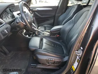 2016 BMW X1 xDrive28i with VIN WBXHT3C36G5E48019, listed as a Copart auction lot 51843235 with 95,711 mi miles and Salvage Title. Bid and sale history available at carsss.com. Image 7.