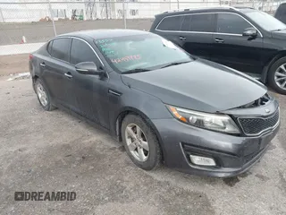 2015 Kia Optima LX z VIN KNAGM4A79F5621123, wystawiony jako IAAI lot #42459785 z przebiegiem 207 194 mil mil oraz . Historia ofert i sprzedaży dostępna na DreamBid. Obrazek 1.