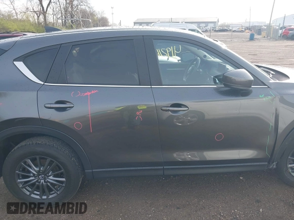 2020 Mazda CX-5 Touring with VIN JM3KFBCM8L0863951, listed as a IAAI auction lot 41921635 with 88,629 mi miles. Bid and sale history available at carsss.com. Image 13.