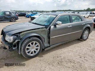 2010 Chrysler 300 C Hemi with VIN 2C3CA6CT6AH123564, listed as a Copart auction lot 60616435 with 169,045 mi miles and Salvage title. Bid and sale history available at DreamBid. Image 1.