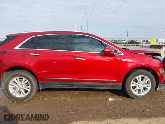 2021 Cadillac XT5 FWD Luxury with VIN 1GYKNAR45MZ125383, listed as a IAAI auction lot 41685947 with 64,997 mi miles. Bid and sale history available at carsss.com. Image 14.